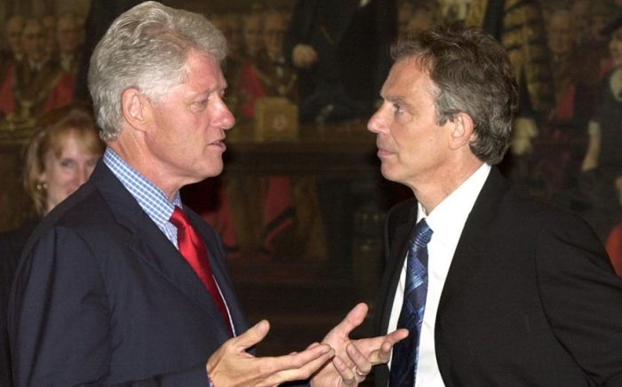 &Eta; &Alpha;&mu;&epsilon;&rho;&iota;&kappa;&alpha;&nu;&omicron;&beta;&rho;&epsilon;&tau;&alpha;&nu;&iota;&kappa;&eta;́ &epsilon;&pi;&iota;́&theta;&epsilon;&sigma;&eta; &kappa;&alpha;&tau;&alpha;́ &tau;&omicron;&upsilon; &Iota;&rho;&alpha;́&kappa; &tau;&omicron; 1998